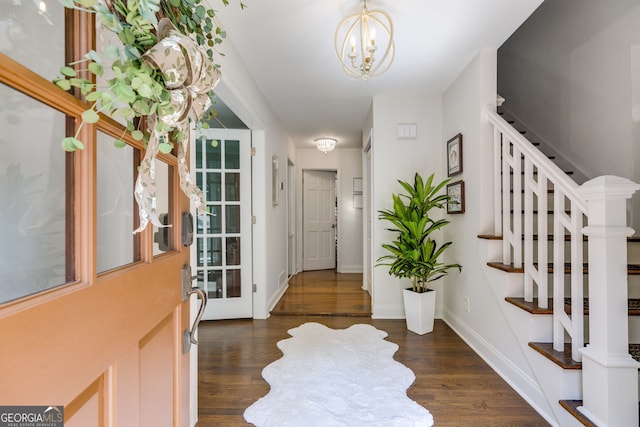 7250 Hunters Branch Dr, Atlanta, GA 30328 - entryway featuring stairway, a chandelier, and wood finished floors