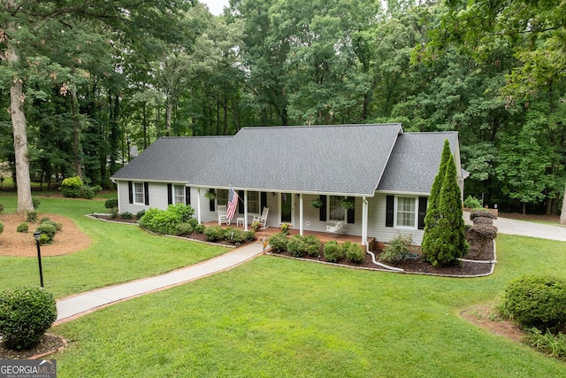 1505 Misty Valley Dr, Chatsworth, GA 30705 - view of front facade featuring covered porch, a front lawn, and roof with shingles