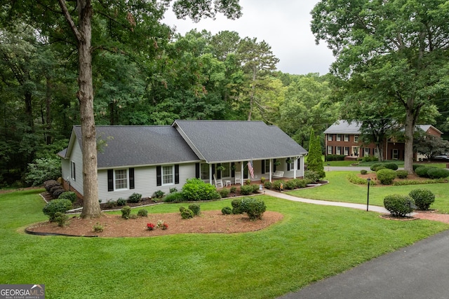 1505 Misty Valley Dr, Chatsworth, GA 30705 - view of front of property with covered porch, a front lawn, and a shingled roof