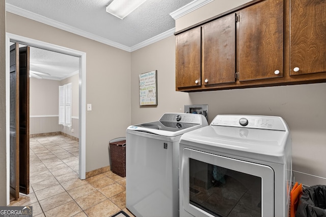 1505 Misty Valley Dr, Chatsworth, GA 30705 - laundry room featuring cabinet space, a textured ceiling, independent washer and dryer, crown molding, and light tile patterned floors