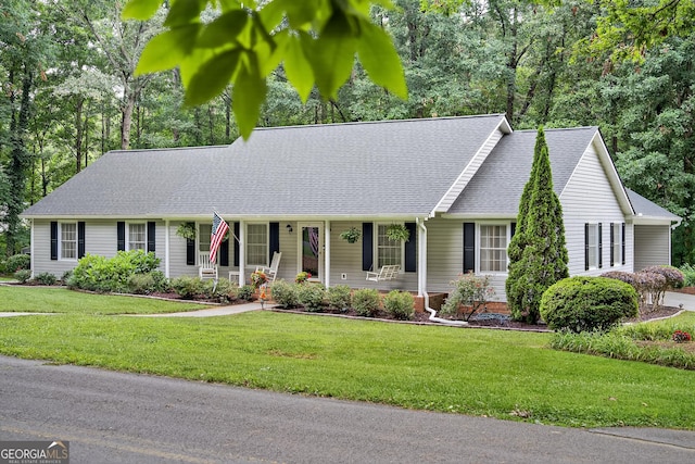 1505 Misty Valley Dr, Chatsworth, GA 30705 - view of front of house featuring a front yard and roof with shingles
