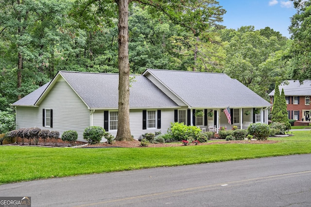 1505 Misty Valley Dr, Chatsworth, GA 30705 - view of front facade featuring a porch, a front yard, and a shingled roof