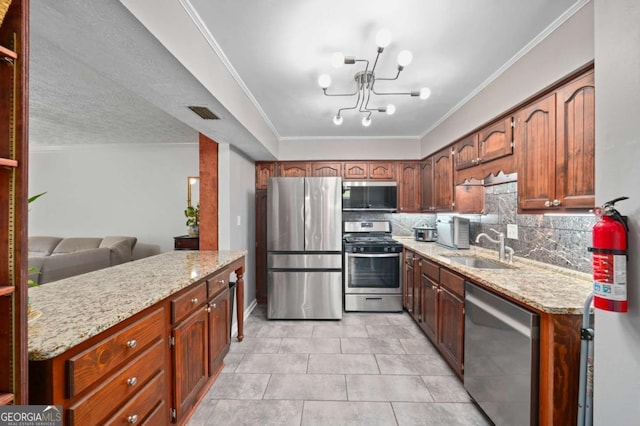 834 Lake Hollow Blvd SW, Marietta, GA 30064 - kitchen with stainless steel appliances, tasteful backsplash, light tile patterned floors, ornamental molding, and a chandelier