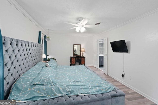 834 Lake Hollow Blvd SW, Marietta, GA 30064 - bedroom with wood finished floors, ornamental molding, and ceiling fan
