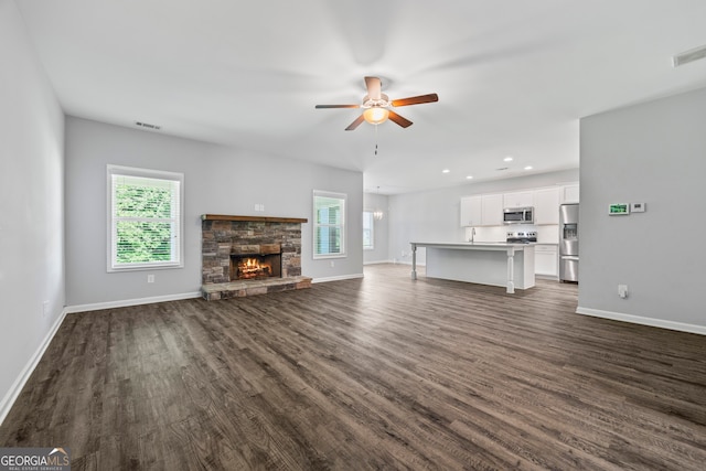 502 Wilbanks Rd, Alto, GA 30510 - unfurnished living room with plenty of natural light, dark wood-type flooring, a ceiling fan, and recessed lighting