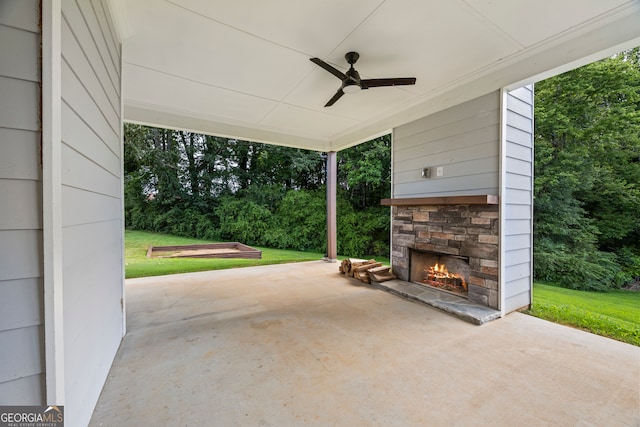 502 Wilbanks Rd, Alto, GA 30510 - view of patio / terrace featuring an outdoor stone fireplace and a ceiling fan