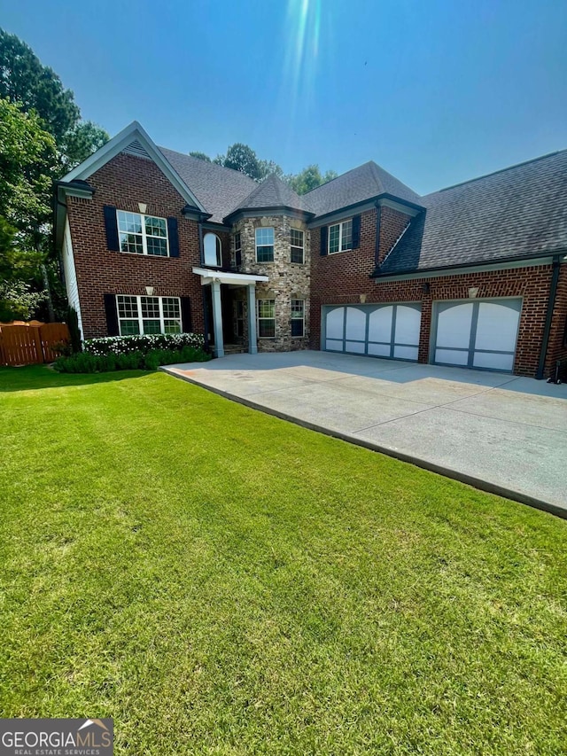 3499 Lake Mill Rd, Buford, GA 30519 - view of front of home featuring brick siding, driveway, and an attached garage