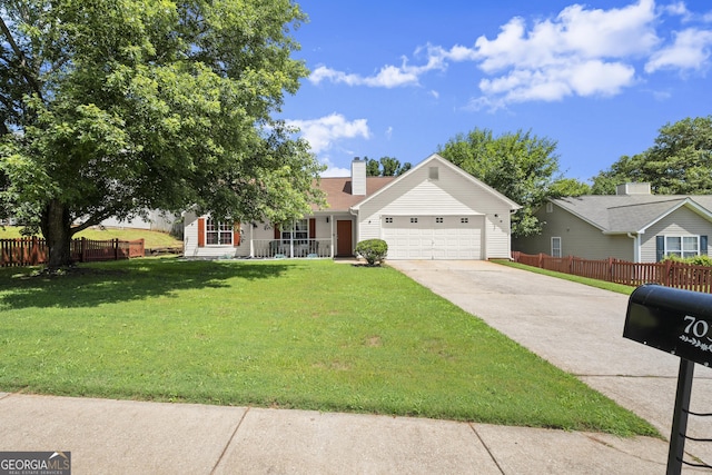 7030 Kingston Ln, Mcdonough, GA 30253 - view of front of home featuring a garage, concrete driveway, a chimney, and covered porch
