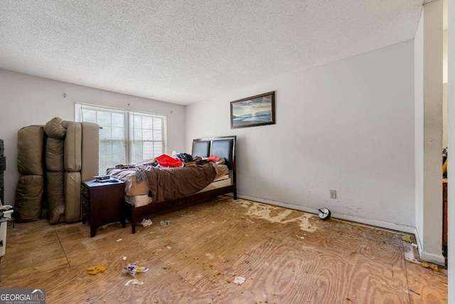 1003 Cannongate Xing SW, Marietta, GA 30064 - bedroom featuring a textured ceiling