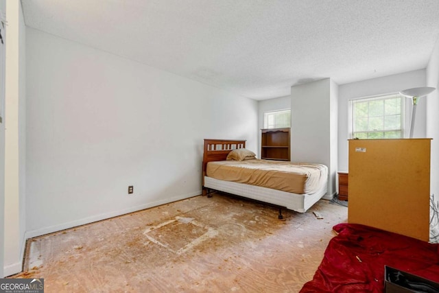 1003 Cannongate Xing SW, Marietta, GA 30064 - bedroom featuring a textured ceiling