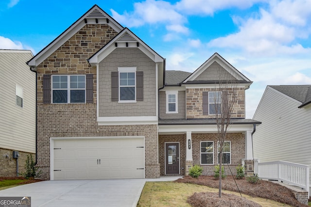 714 Bristol Dr Unit 279A, Loganville, GA 30052 - craftsman-style home featuring concrete driveway, a garage, brick siding, and stone siding
