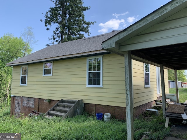 239 E Currahee St, Toccoa, GA 30577 - view of side of home featuring crawl space and a shingled roof