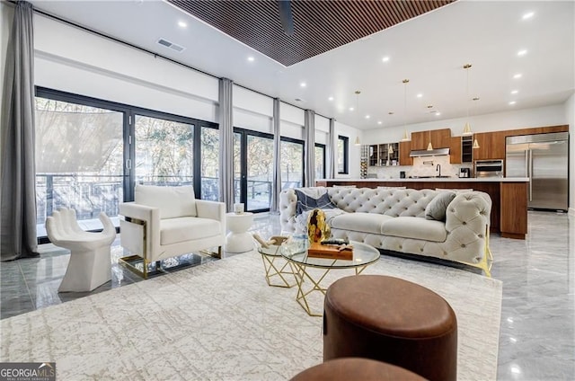 1812 Hunters Gln, Marietta, GA 30062 - living room featuring recessed lighting and light marble finish floors