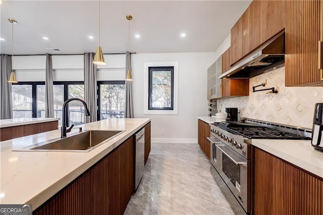 1812 Hunters Gln, Marietta, GA 30062 - kitchen with stainless steel appliances, modern cabinets, under cabinet range hood, tasteful backsplash, and hanging light fixtures