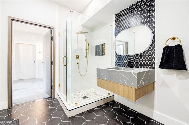 1812 Hunters Gln, Marietta, GA 30062 - full bath featuring a shower stall, vanity, tile patterned floors, and decorative backsplash