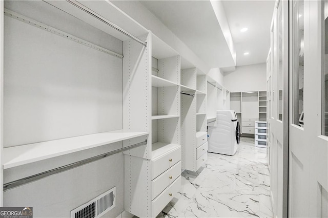 1812 Hunters Gln, Marietta, GA 30062 - spacious closet with light marble finish flooring and washer / clothes dryer