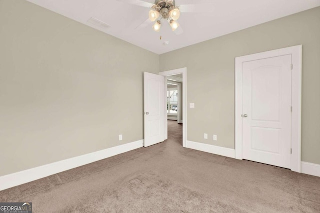 21 Creekview Dr SE, Cartersville, GA 30120 - unfurnished bedroom with carpet and a ceiling fan