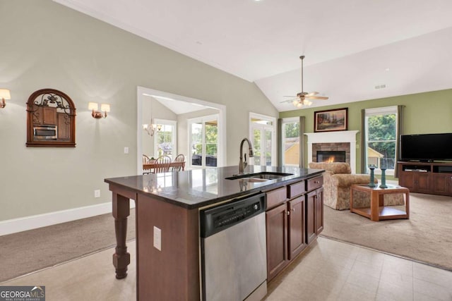 21 Creekview Dr SE, Cartersville, GA 30120 - kitchen with stainless steel dishwasher, light carpet, a stone fireplace, ceiling fan, and lofted ceiling