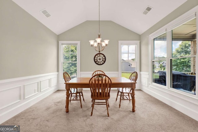 21 Creekview Dr SE, Cartersville, GA 30120 - dining room with a chandelier, carpet flooring, a wainscoted wall, plenty of natural light, and vaulted ceiling