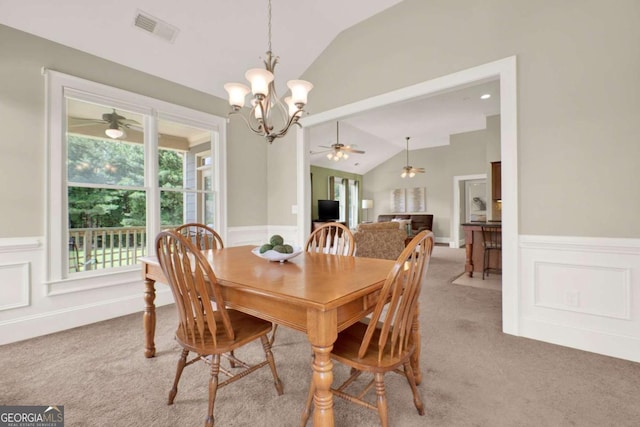 21 Creekview Dr SE, Cartersville, GA 30120 - dining room featuring lofted ceiling, light colored carpet, a wainscoted wall, a chandelier, and ceiling fan
