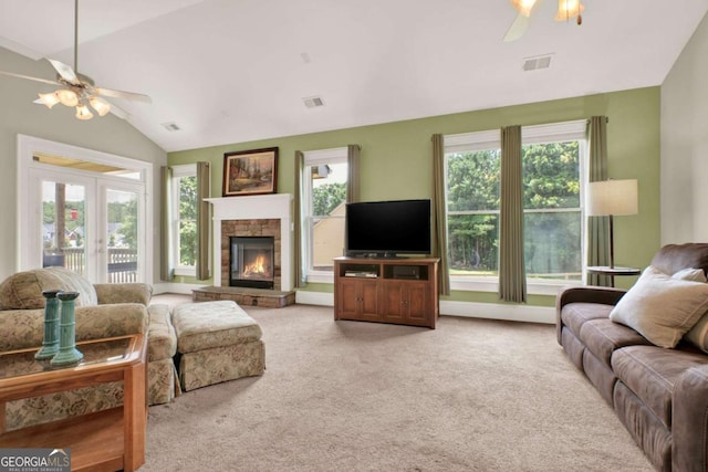 21 Creekview Dr SE, Cartersville, GA 30120 - living room featuring a ceiling fan, vaulted ceiling, carpet, and plenty of natural light