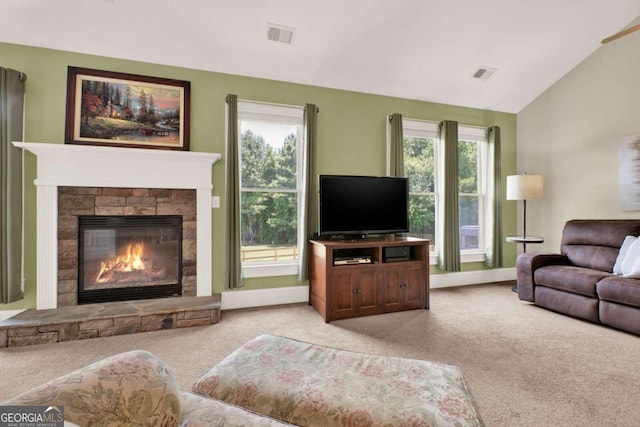 21 Creekview Dr SE, Cartersville, GA 30120 - living area with light carpet, a fireplace, and lofted ceiling