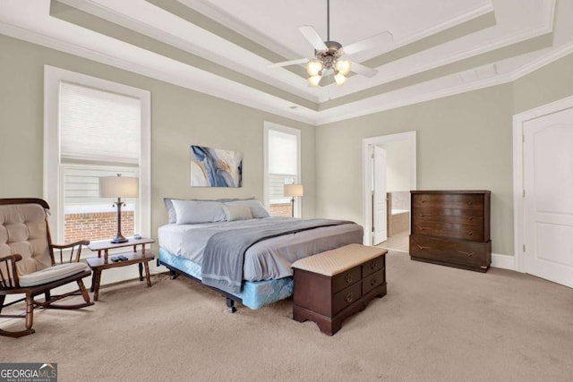 21 Creekview Dr SE, Cartersville, GA 30120 - bedroom featuring a raised ceiling, ornamental molding, light colored carpet, ensuite bathroom, and ceiling fan