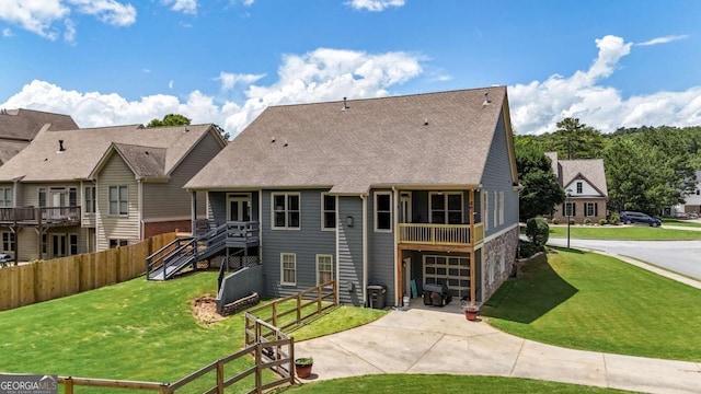 21 Creekview Dr SE, Cartersville, GA 30120 - rear view of house with concrete driveway, a garage, and a shingled roof