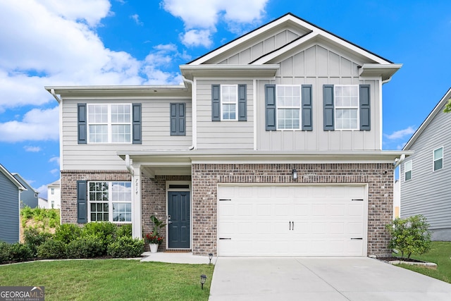 7814 Messina Ct, Lithia Springs, GA 30122 - view of front of home featuring brick siding, driveway, board and batten siding, an attached garage, and a front yard
