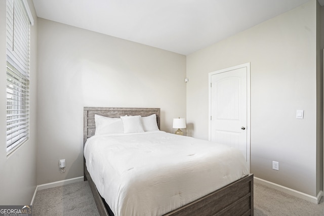 7814 Messina Ct, Lithia Springs, GA 30122 - bedroom featuring carpet floors and baseboards