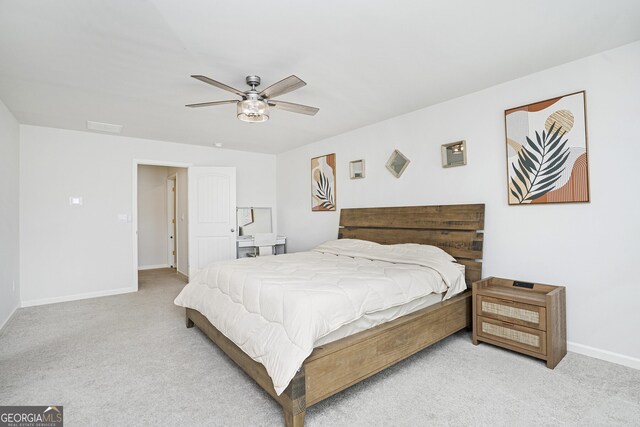 7814 Messina Ct, Lithia Springs, GA 30122 - bedroom featuring carpet floors and ceiling fan