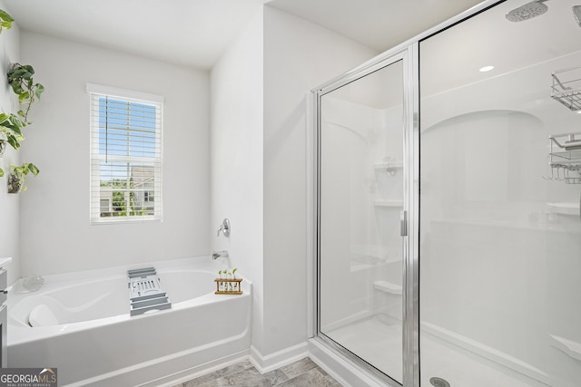 7814 Messina Ct, Lithia Springs, GA 30122 - full bathroom with a shower stall and a garden tub