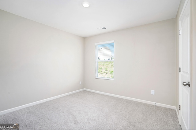 7814 Messina Ct, Lithia Springs, GA 30122 - carpeted spare room featuring baseboards