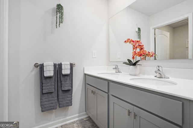 7814 Messina Ct, Lithia Springs, GA 30122 - full bathroom featuring double vanity and baseboards