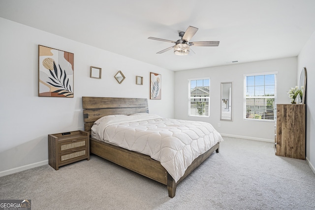 7814 Messina Ct, Lithia Springs, GA 30122 - bedroom featuring carpet and ceiling fan