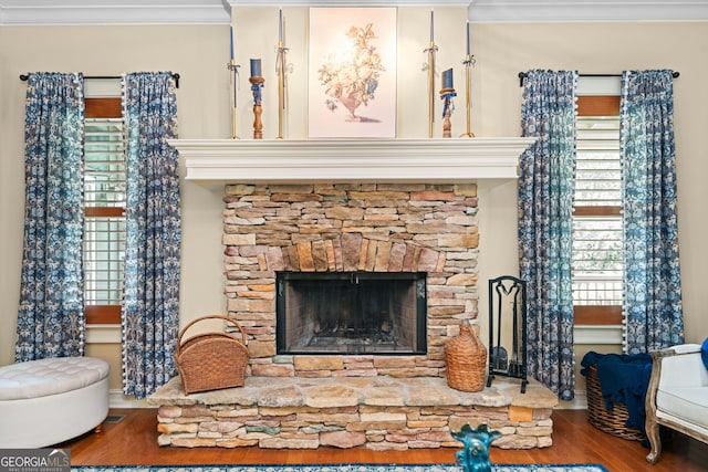 3349 Whitepath Rd, Ellijay, GA 30540 - living room with wood finished floors, ornamental molding, and a stone fireplace