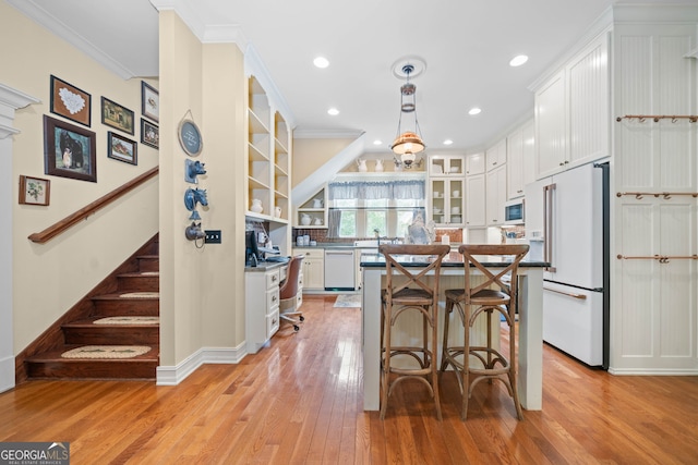 3349 Whitepath Rd, Ellijay, GA 30540 - kitchen featuring white appliances, white cabinetry, light wood-style floors, open shelves, and ornamental molding