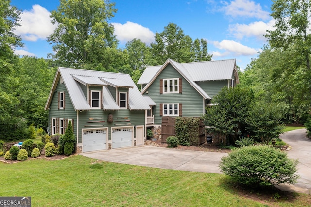 3349 Whitepath Rd, Ellijay, GA 30540 - view of front of property featuring concrete driveway, a front lawn, a metal roof, and an attached garage