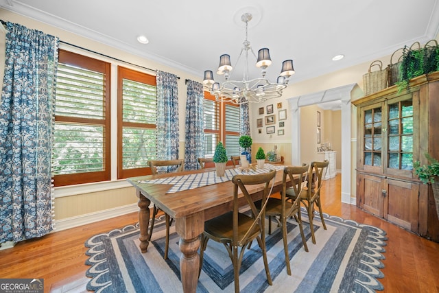 3349 Whitepath Rd, Ellijay, GA 30540 - dining room with a chandelier, wood finished floors, ornamental molding, recessed lighting, and wainscoting