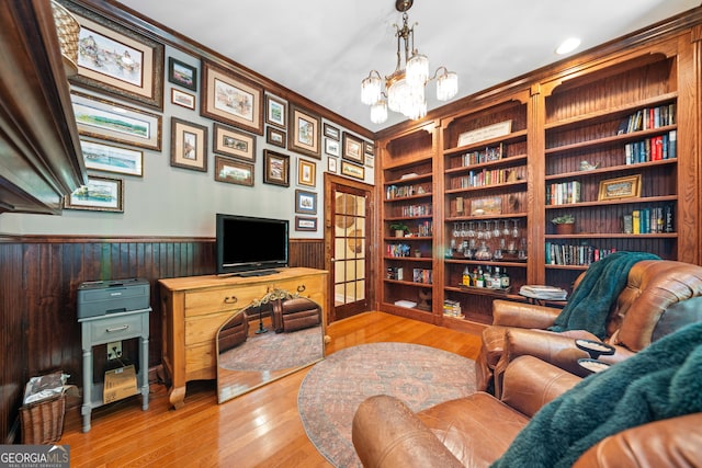3349 Whitepath Rd, Ellijay, GA 30540 - office space with a chandelier, hardwood / wood-style floors, a wainscoted wall, crown molding, and built in shelves