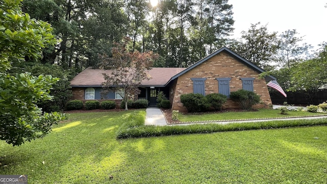 4710 Cedar Brook Dr SE, Conyers, GA 30094 - view of front of property featuring brick siding and a front yard