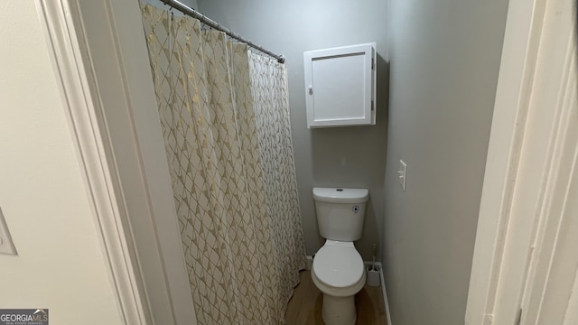 4710 Cedar Brook Dr SE, Conyers, GA 30094 - full bathroom featuring toilet and a shower with curtain