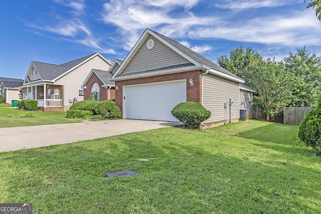 129 Larkspur Ln, Bonaire, GA 31005 - view of front of property with driveway, brick siding, and a garage