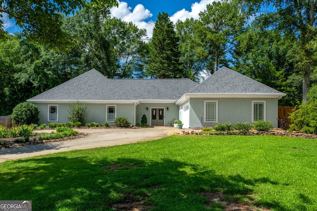 4016 Dover Ave, Alpharetta, GA 30009 - view of front facade featuring stucco siding, a shingled roof, french doors, and driveway