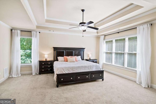 214 Davis Mill Rd, Ball Ground, GA 30107 - bedroom featuring crown molding, carpet flooring, a tray ceiling, and a ceiling fan