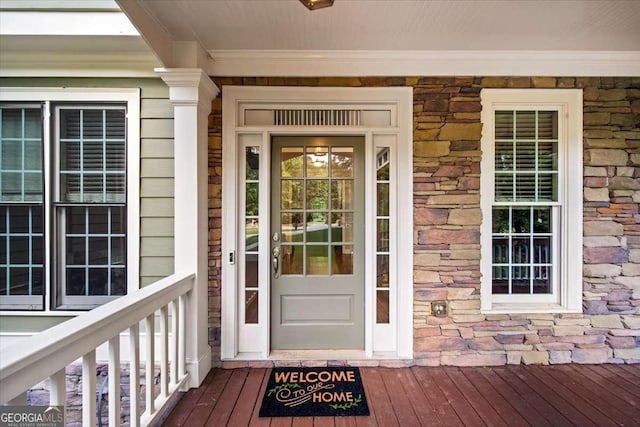 214 Davis Mill Rd, Ball Ground, GA 30107 - doorway to property featuring stone siding and a porch