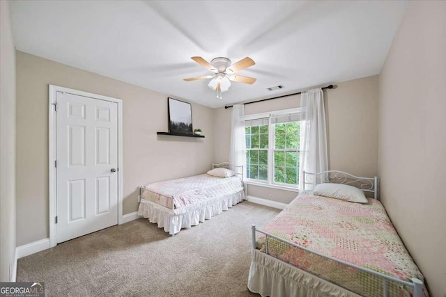 214 Davis Mill Rd, Ball Ground, GA 30107 - carpeted bedroom featuring baseboards and ceiling fan