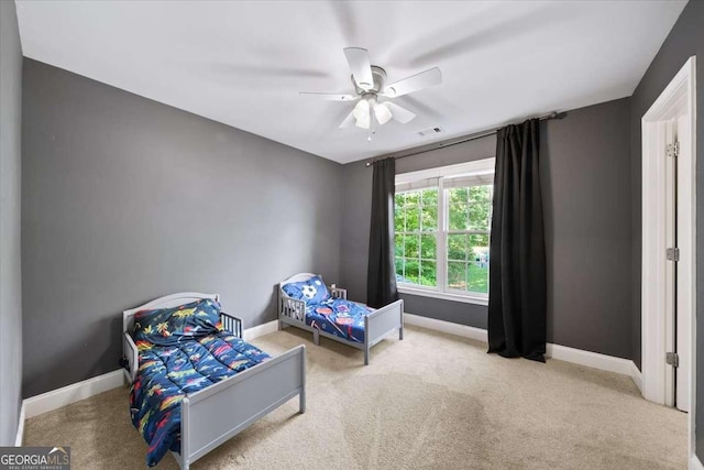 214 Davis Mill Rd, Ball Ground, GA 30107 - carpeted bedroom featuring baseboards and ceiling fan