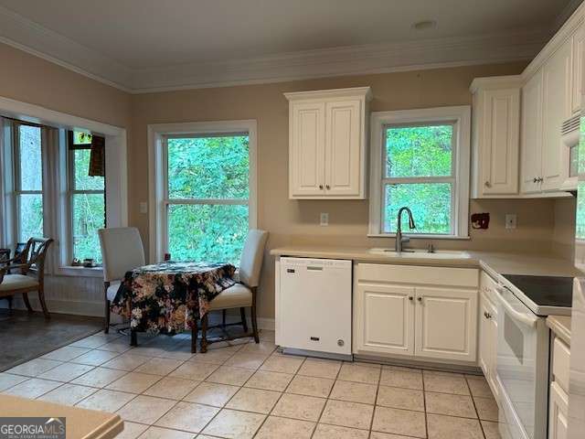 3131 Rocky Branch Rd Unit 280, Watkinsville, GA 30677 - kitchen featuring white appliances, light tile patterned floors, ornamental molding, and white cabinetry