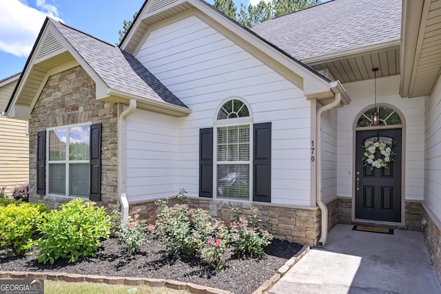 170 Saddleridge Dr, Bremen, GA 30110 - doorway to property with stone siding and a shingled roof